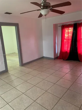 a view of a livingroom with a furniture and a window