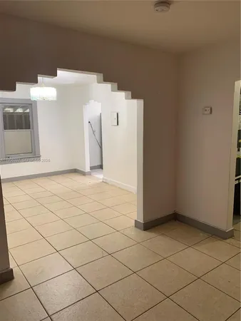 a view of a utility room with a sink