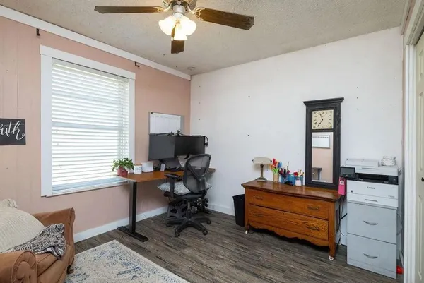a room with furniture and window