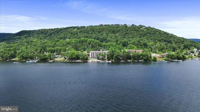 a view of a street with a building in the background