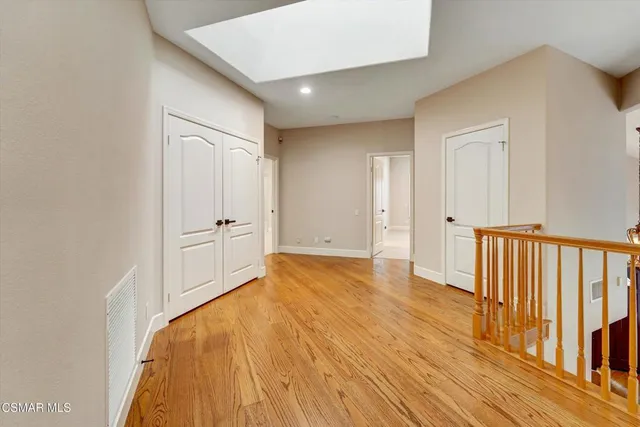 a view of a livingroom with wooden floor
