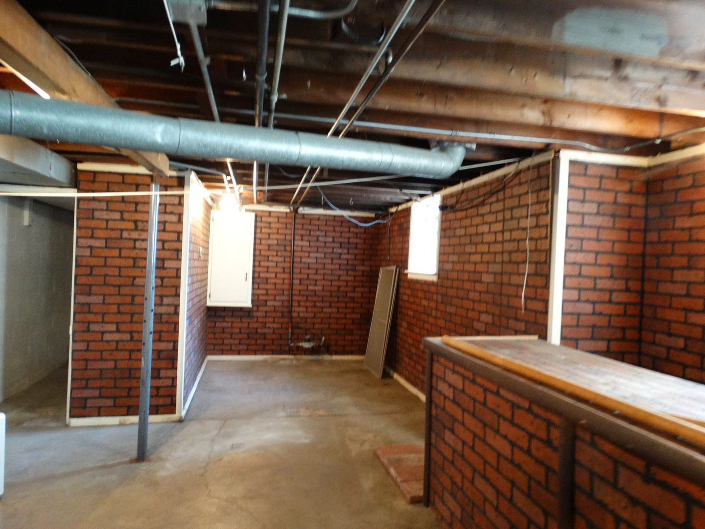 1023 Garfield Street Lockport, IL 60441 - Photo 13 of 14 a view of an empty room with wooden walls