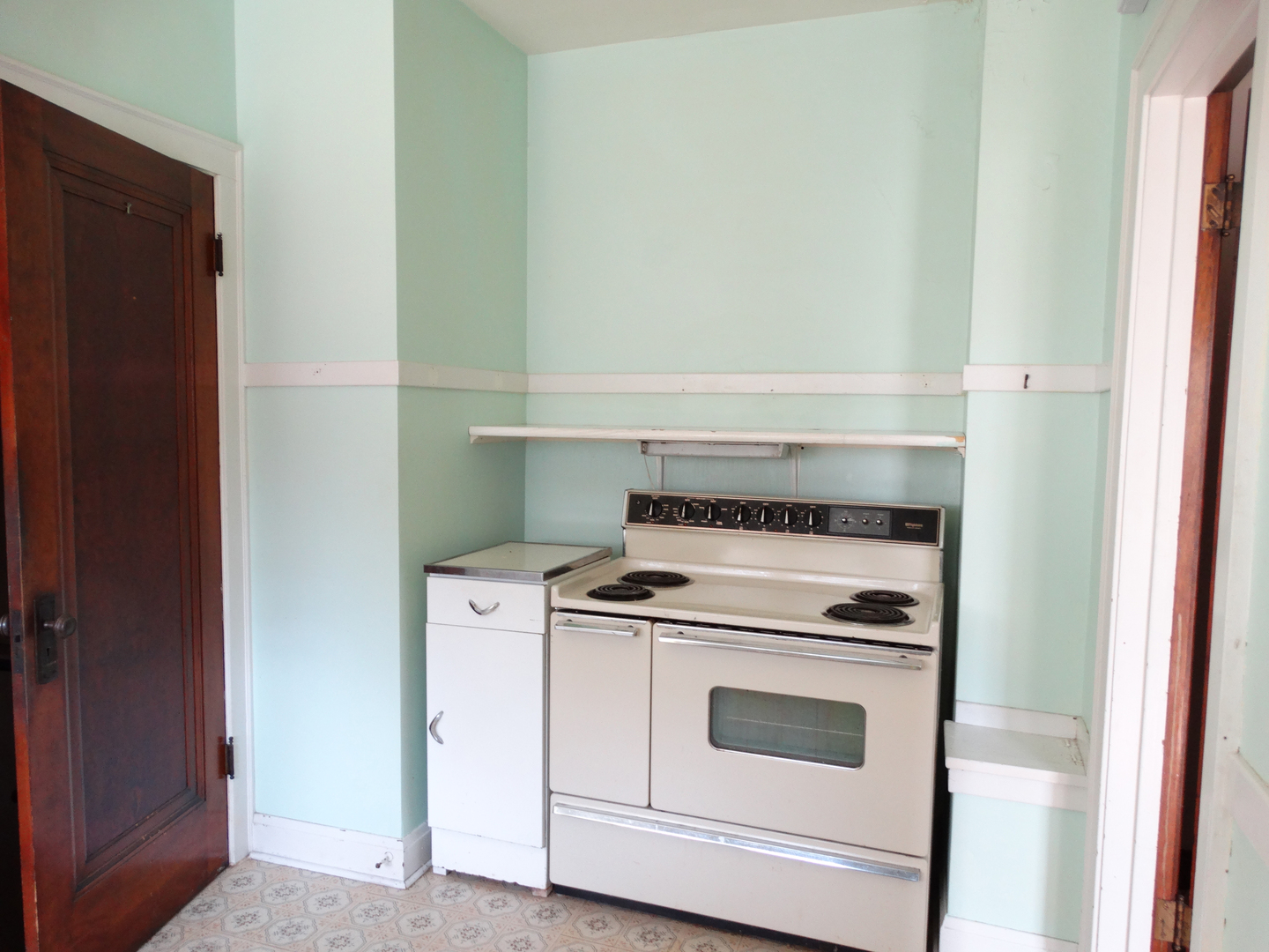 1023 Garfield Street Lockport, IL 60441 - Photo 8 of 14 a stove top oven sitting inside of a kitchen