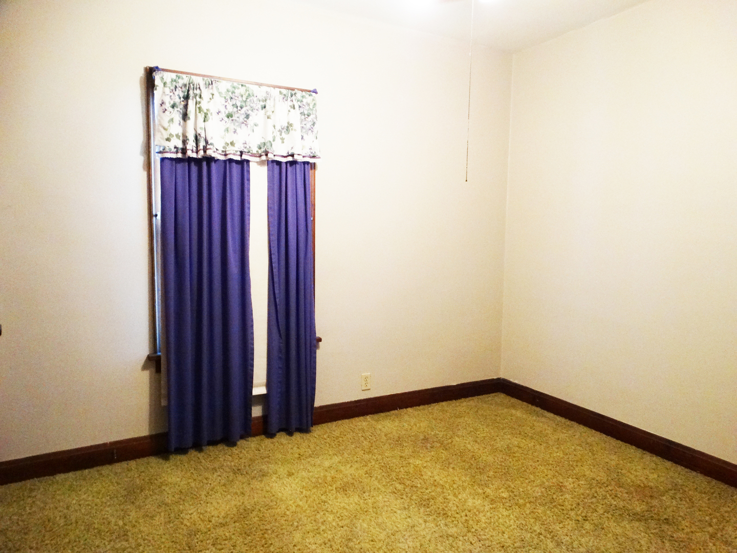 1023 Garfield Street Lockport, IL 60441 - Photo 10 of 14 a view of a room with wooden floor and a bathroom