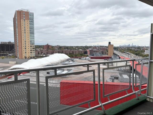 61-15 97th Street, Unit 15P Queens, NY 11374 - Photo 11 of 18 a view of a balcony with furniture