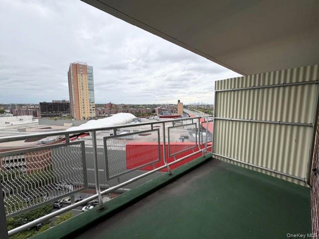 61-15 97th Street, Unit 15P Queens, NY 11374 - Photo 12 of 18 a terrace with a city view