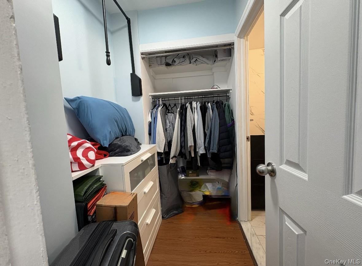 61-15 97th Street, Unit 15P Queens, NY 11374 - Photo 10 of 18 a utility room with dryer and washer