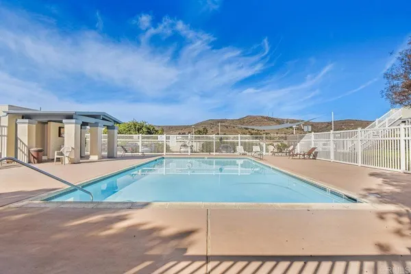 a view of a house with a swimming pool