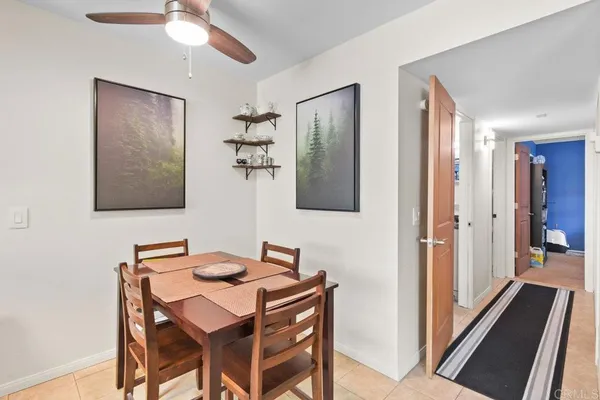 a kitchen with a stove a sink and a refrigerator