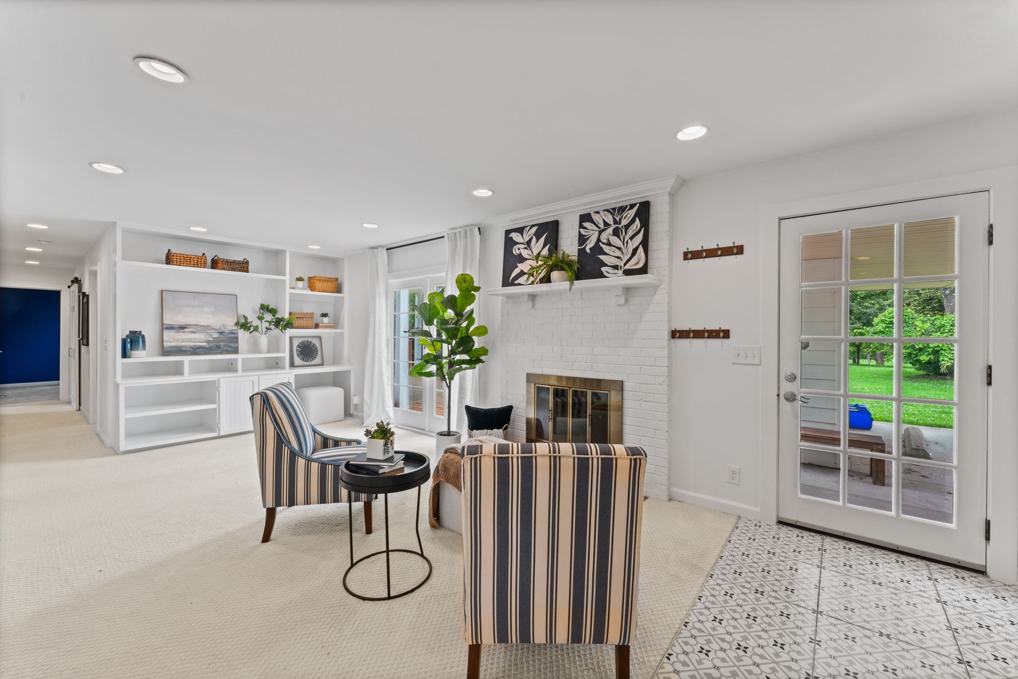 4021 Arno Road Franklin, TN 37064 - Photo 12 of 31 a outdoor space with furniture a flat screen tv and a large window