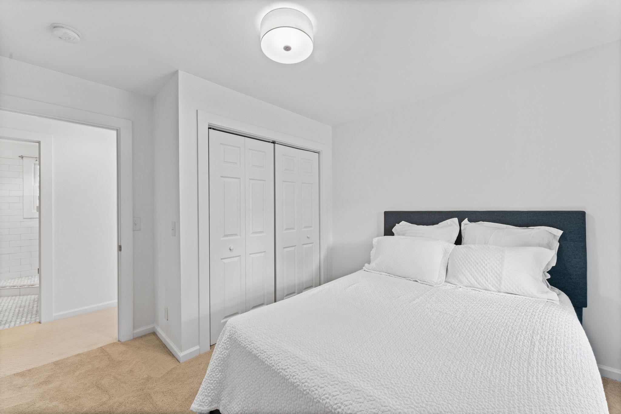 4021 Arno Road Franklin, TN 37064 - Photo 15 of 31 a bedroom with a bed and a night stand