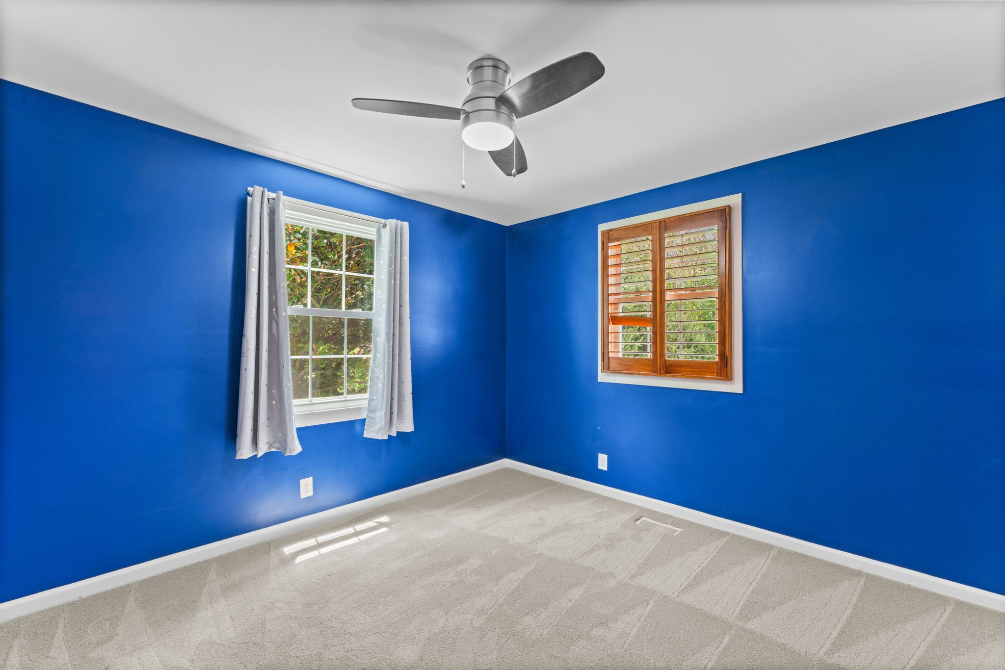 4021 Arno Road Franklin, TN 37064 - Photo 24 of 31 an empty room with windows and ceiling fan