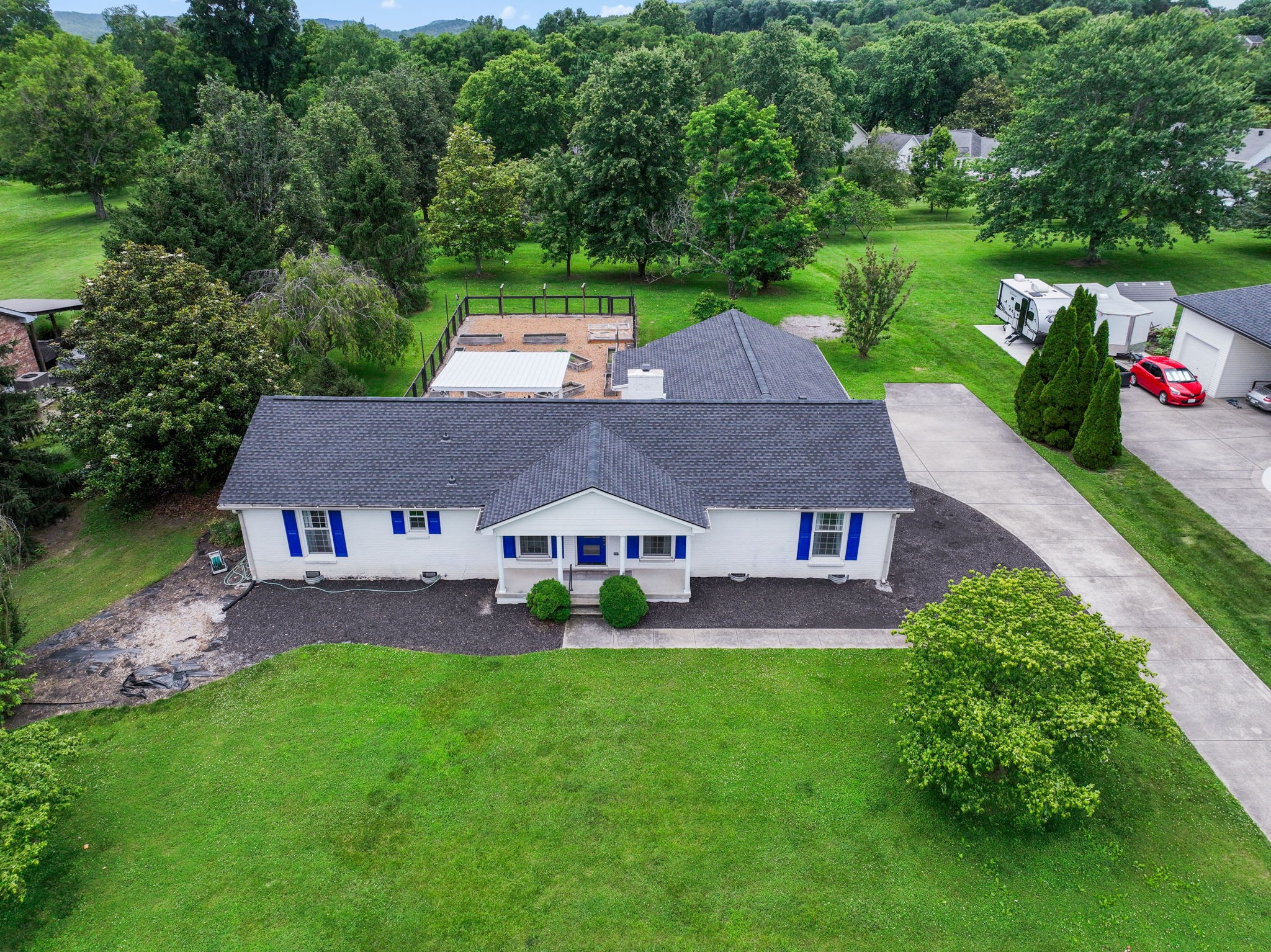 4021 Arno Road Franklin, TN 37064 - Photo 28 of 31 an aerial view of a house with garden space and a street view