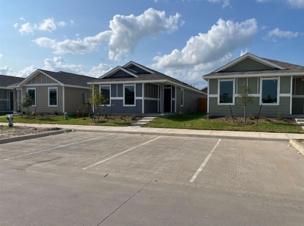 252 Jethro Lane Princeton, TX 75407 - Photo 19 of 20 a front view of a house with a yard