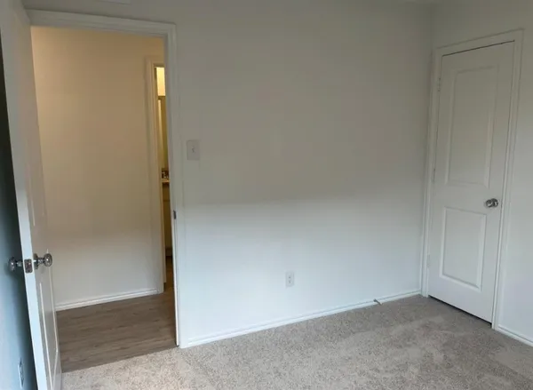 an empty room with closet