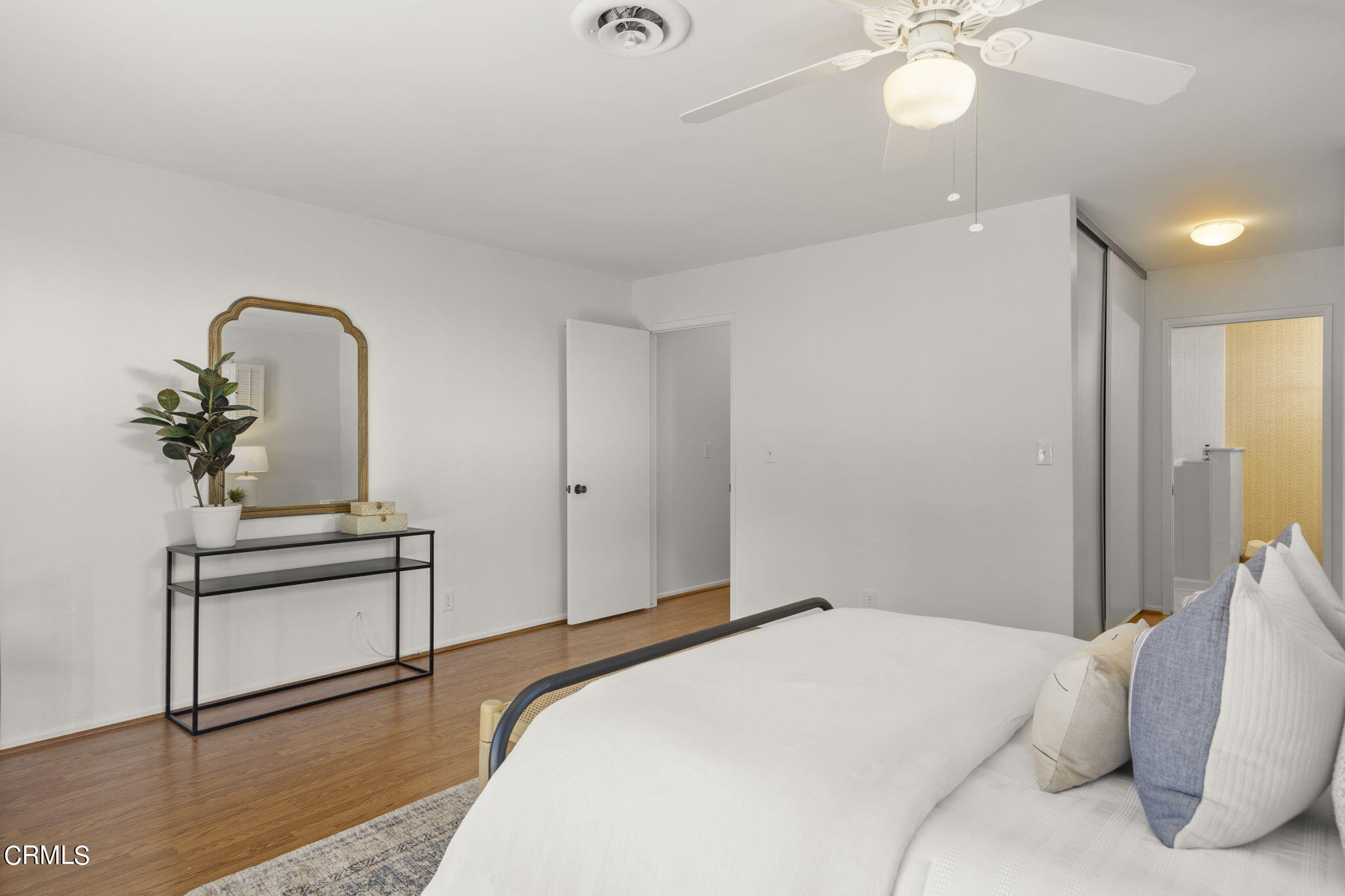 410 Church Road, Unit 25 Ojai, CA 93023 - Photo 13 of 24 a bedroom with a bed and a chandelier