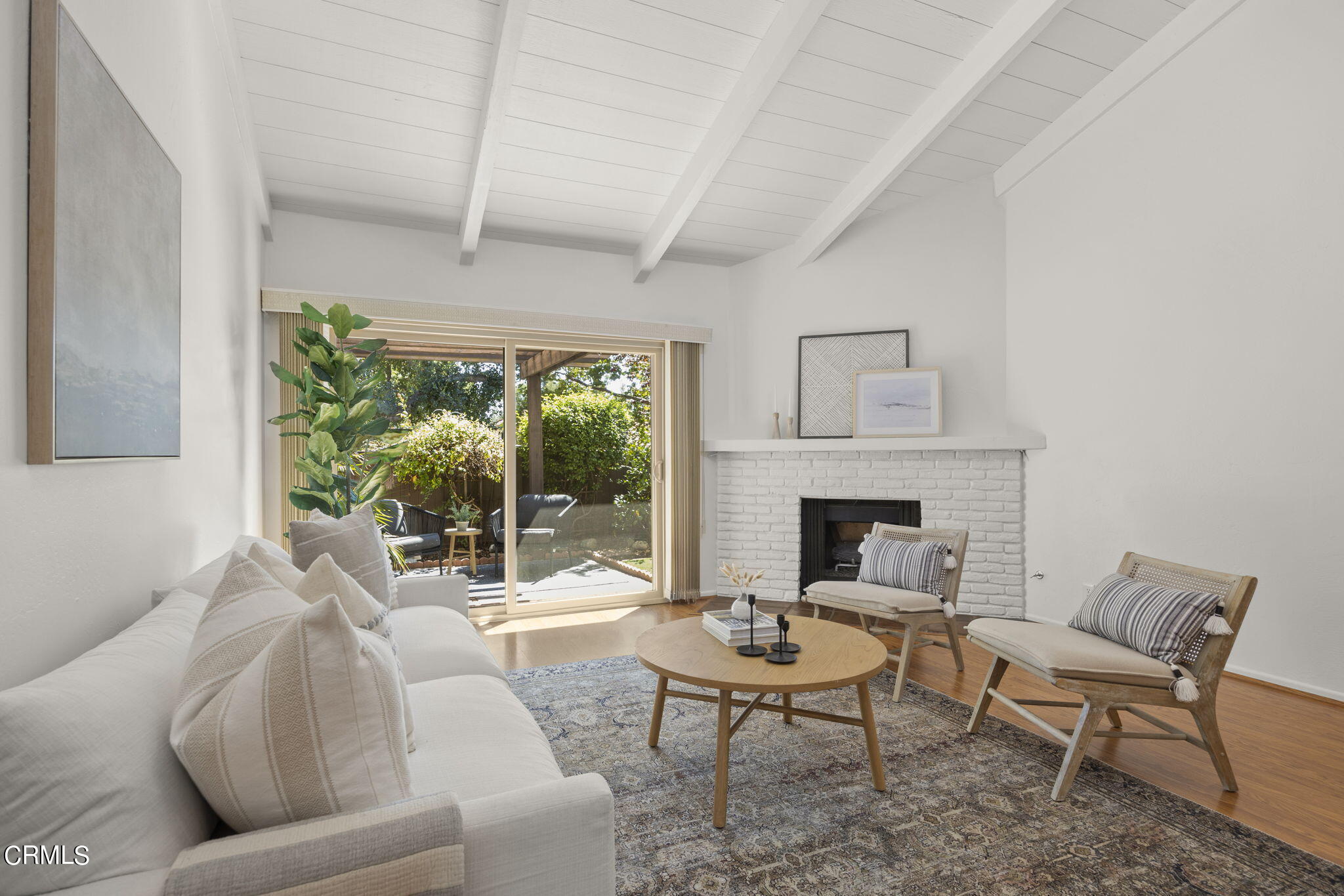 410 Church Road, Unit 25 Ojai, CA 93023 - Photo 2 of 24 a living room with furniture fireplace and a large window