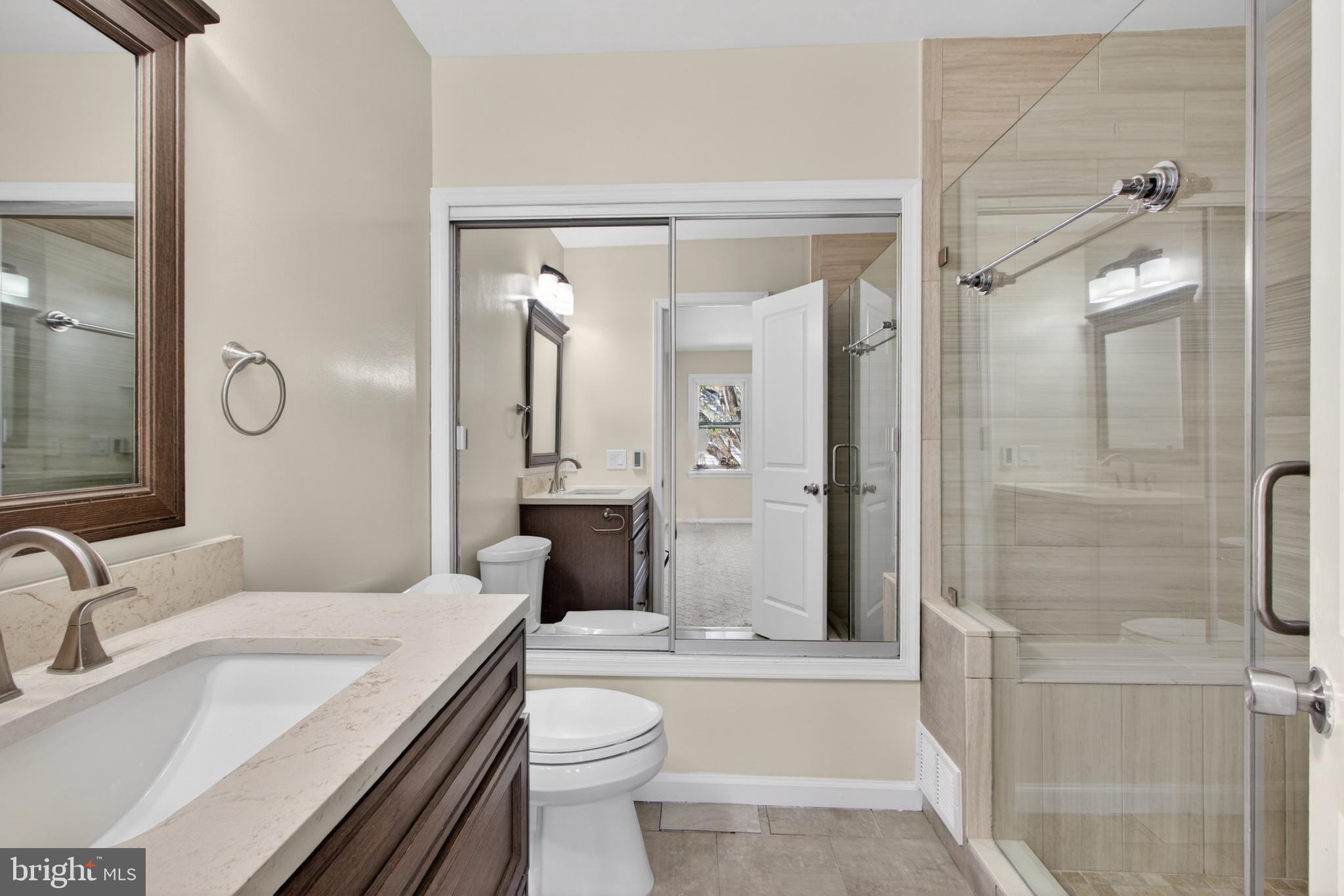 16 Redding Ridge Drive Gaithersburg, MD 20878 - Photo 33 of 53 Modern bathroom with sleek finishes.
