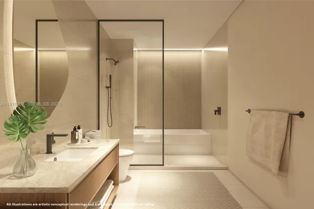 a bathroom with a bathtub and a sink