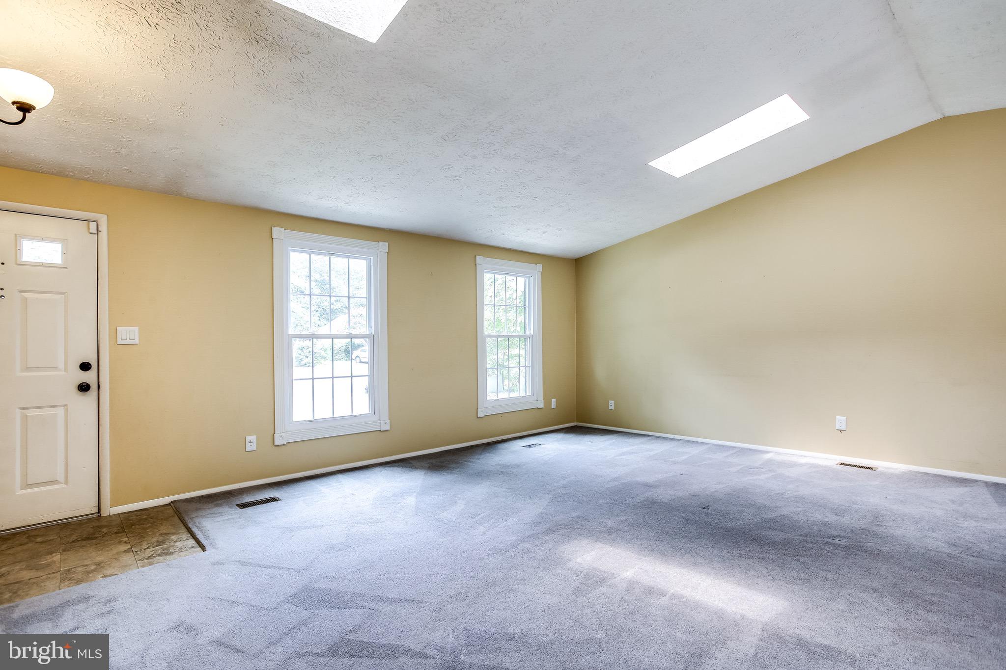 7719 Baggins Road Hanover, MD 21076 - Photo 3 of 30 Foyer Opens into Family Room