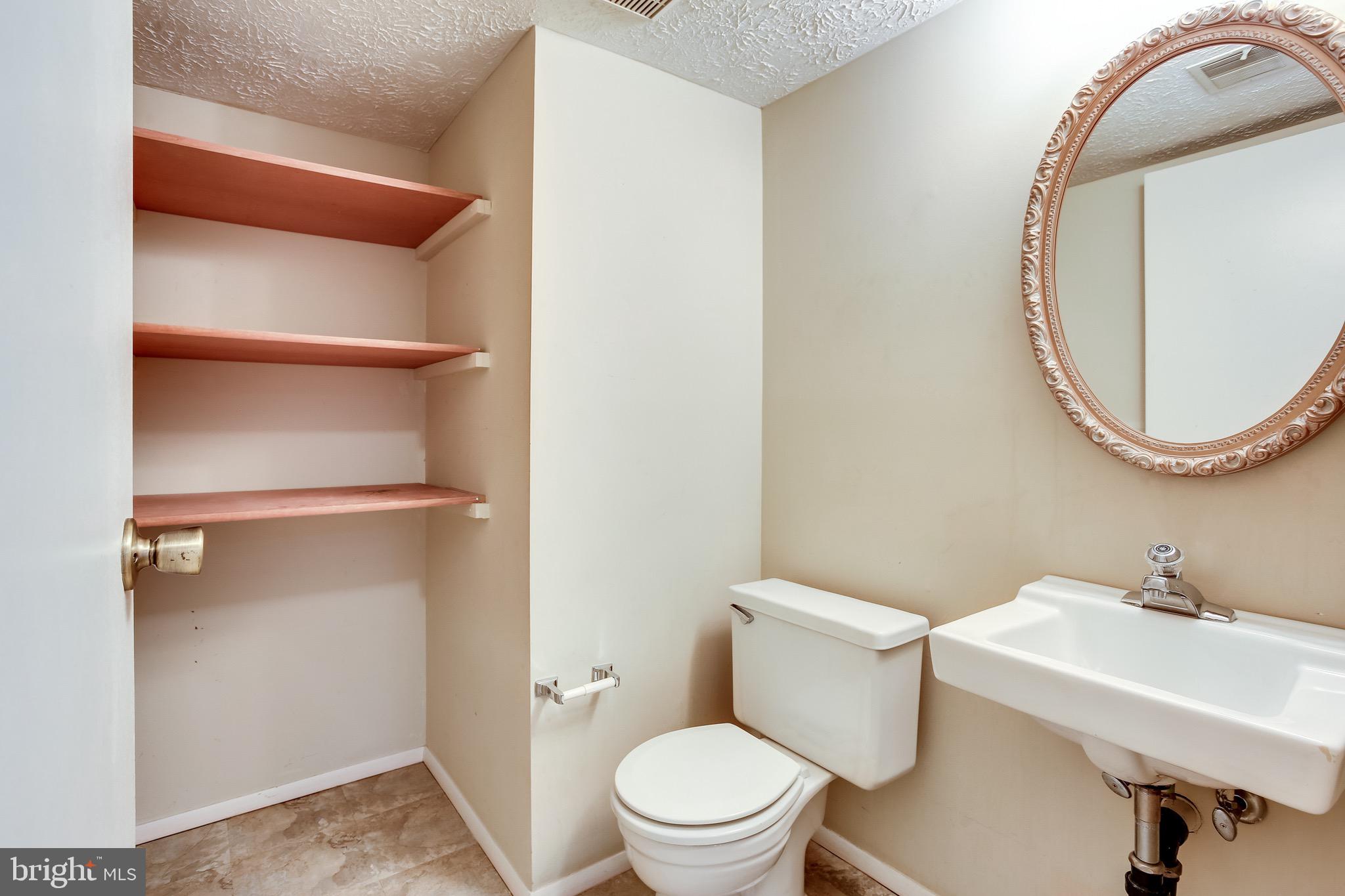 7719 Baggins Road Hanover, MD 21076 - Photo 23 of 30 Lower Level Half Bath