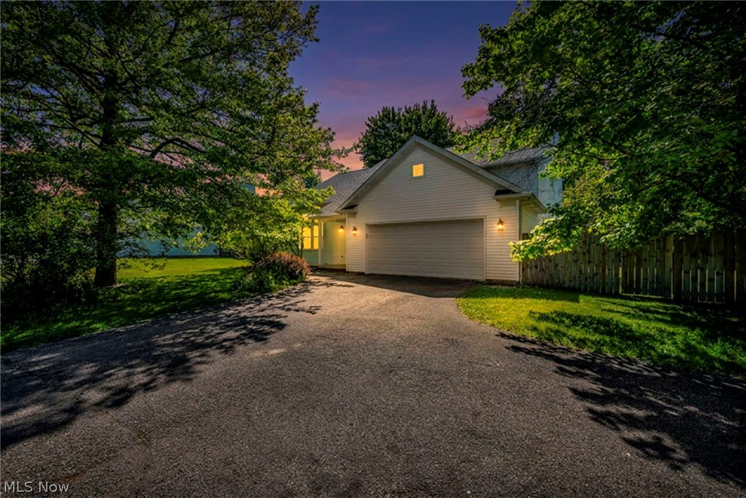 9842 Johnnycake Ridge Road Mentor, OH 44060 - Photo 2 of 40 Two-car garage with white paneled door