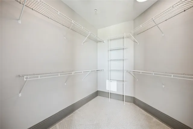 a view of an empty walk in closet