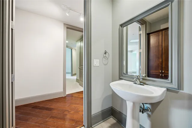 a bathroom with a sink and a mirror