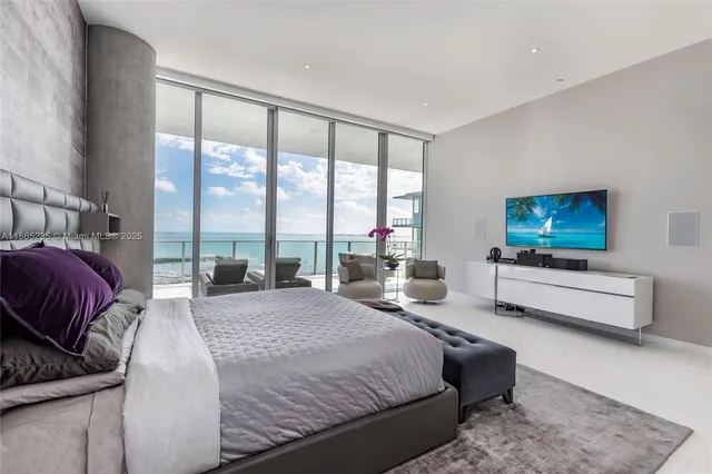 a kitchen with a large window and a counter top space