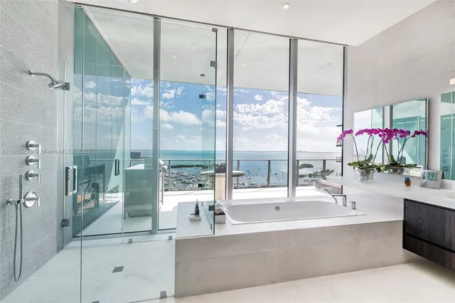 a bathroom with a sink vanity and a mirror
