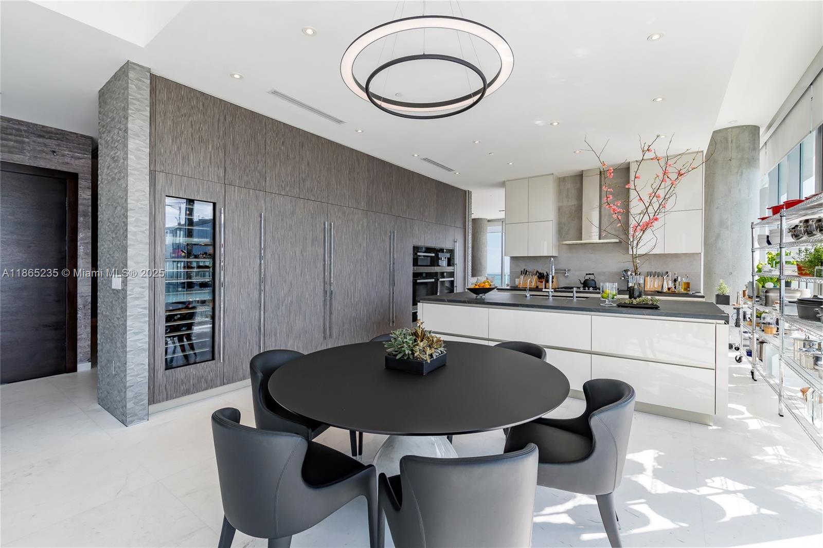 2669 South Bayshore Drive, Unit PH1N Coconut Grove, FL 33133 - Photo 22 of 39 a dining room with furniture and window