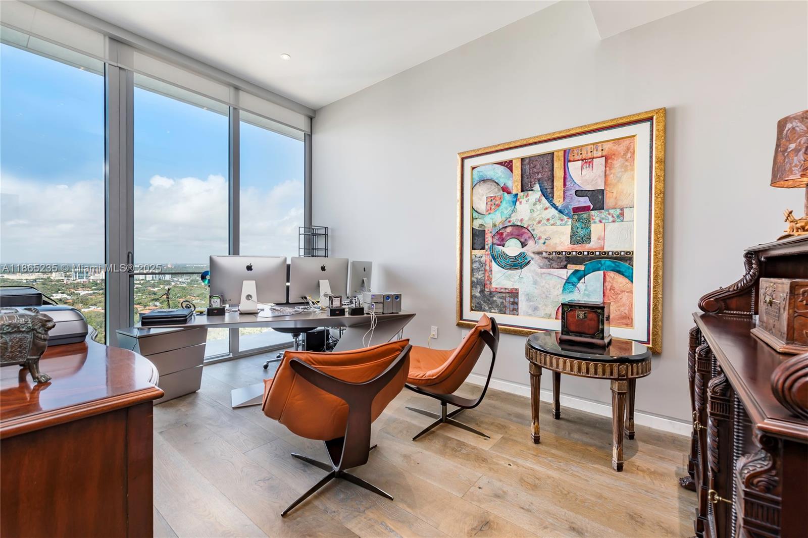 2669 South Bayshore Drive, Unit PH1N Coconut Grove, FL 33133 - Photo 30 of 39 a living room with furniture a piano and a flat screen tv