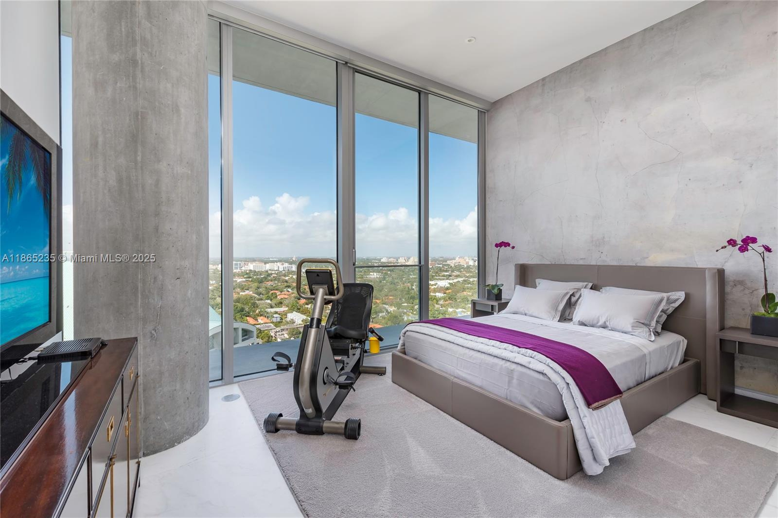 2669 South Bayshore Drive, Unit PH1N Coconut Grove, FL 33133 - Photo 34 of 39 a bed room with a bed and a large window