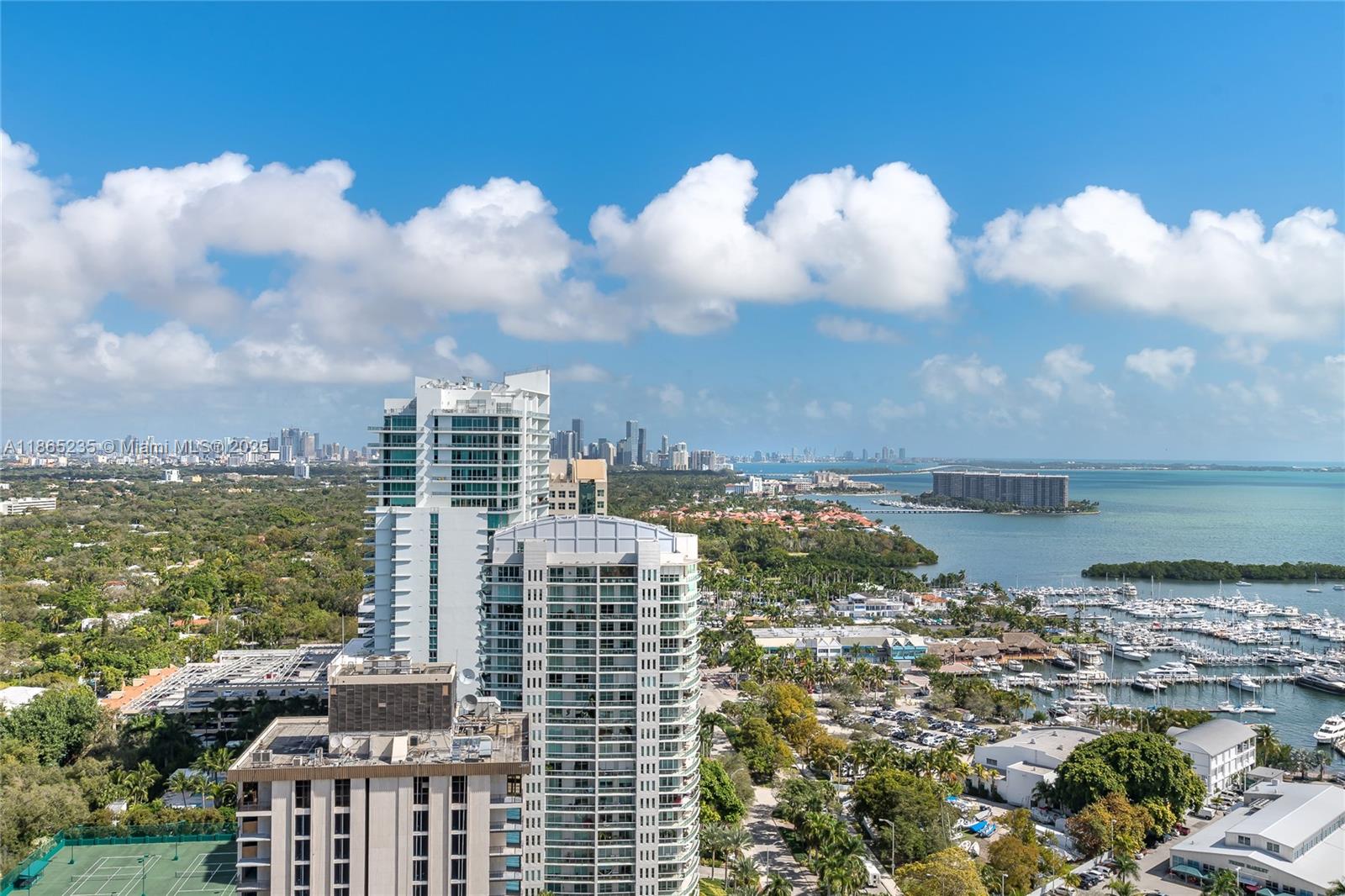 2669 South Bayshore Drive, Unit PH1N Coconut Grove, FL 33133 - Photo 39 of 39 a view of a lake and building