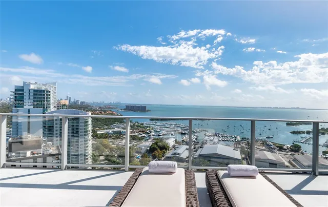 a view of a balcony with city view