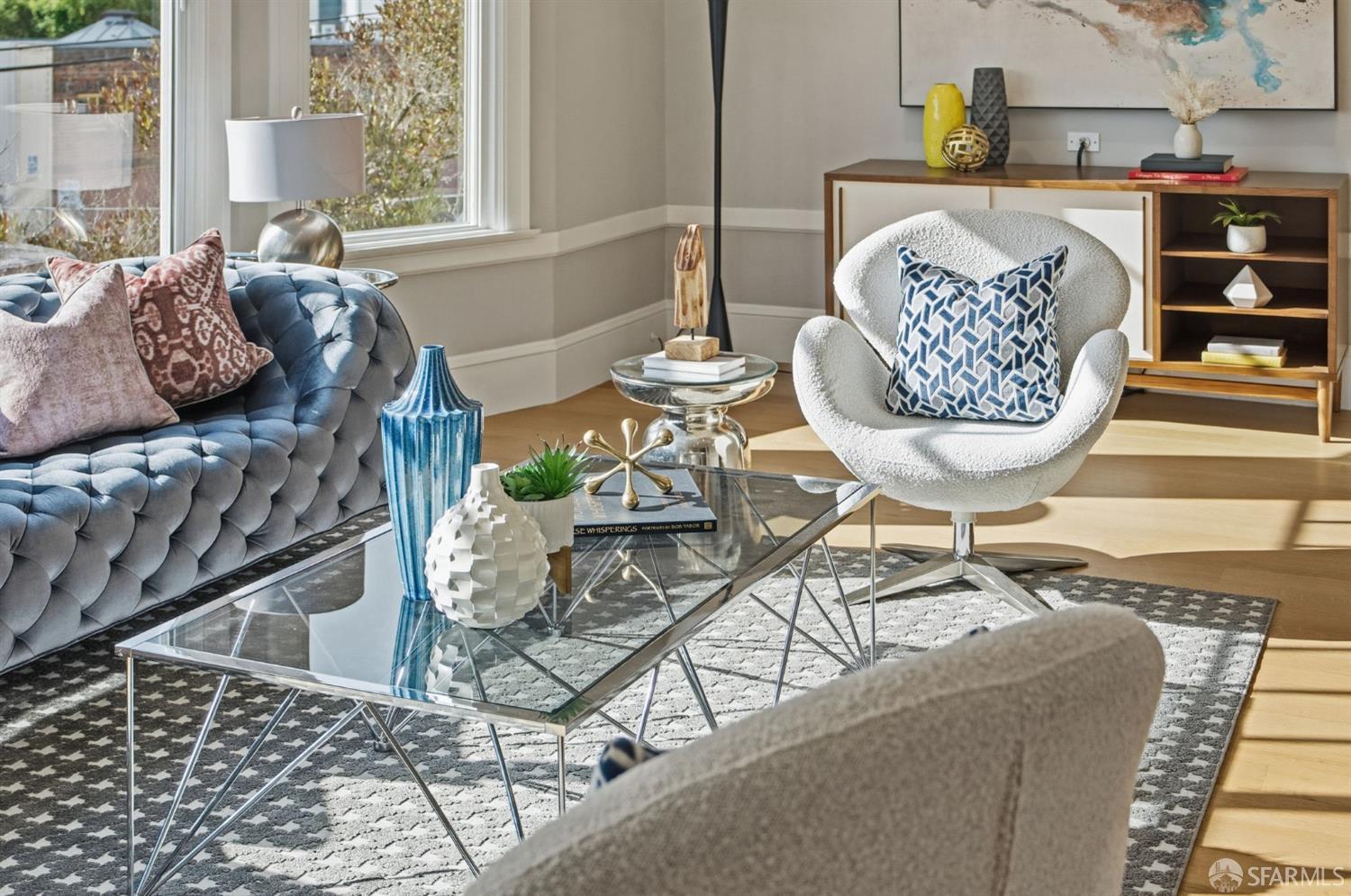 a living room with a couch and a table