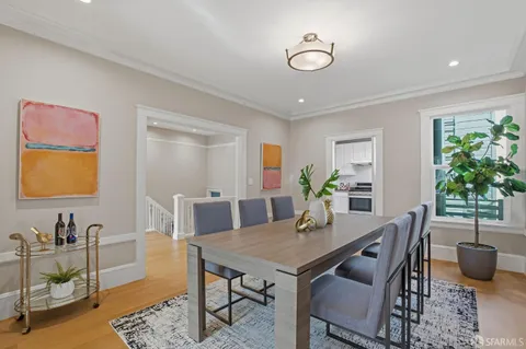 a view of a dining room with furniture