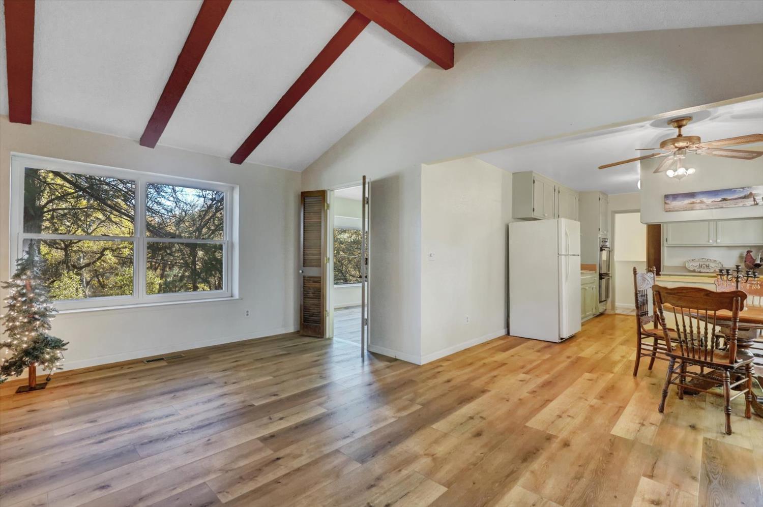23126 Foothill Road Auburn, CA 95602 - Photo 12 of 63 a view of livingroom with furniture and wooden floor