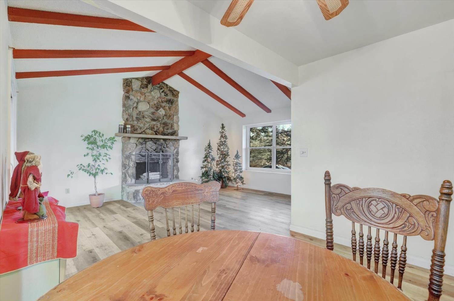 23126 Foothill Road Auburn, CA 95602 - Photo 17 of 63 a bedroom with furniture and a window