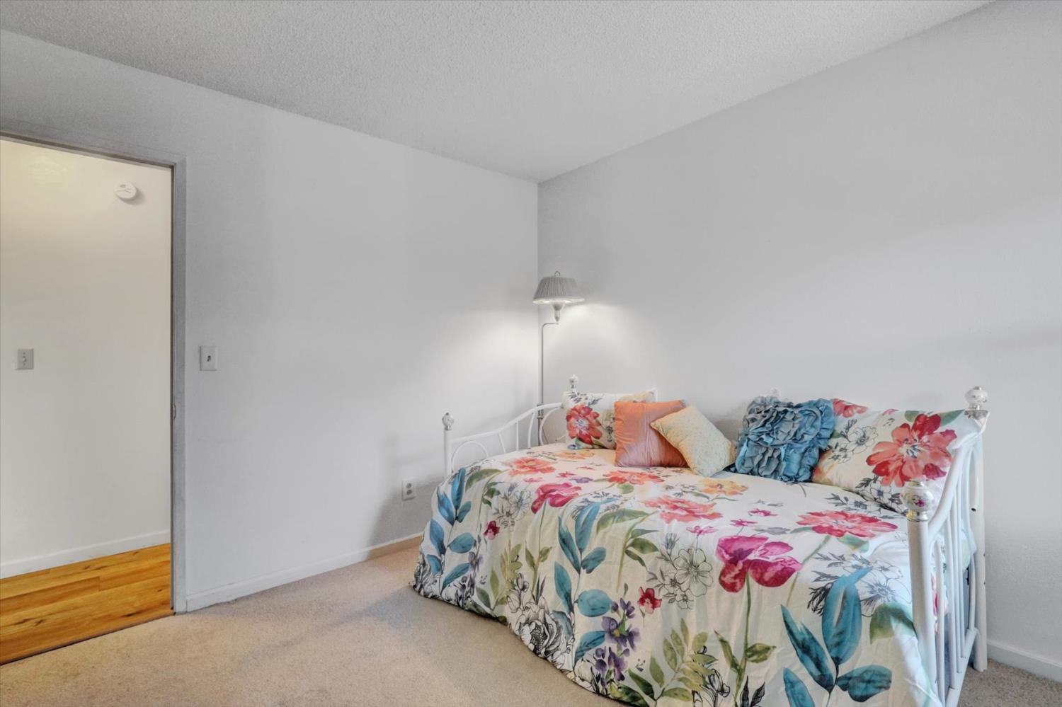 23126 Foothill Road Auburn, CA 95602 - Photo 28 of 63 a bedroom with a bed and a window