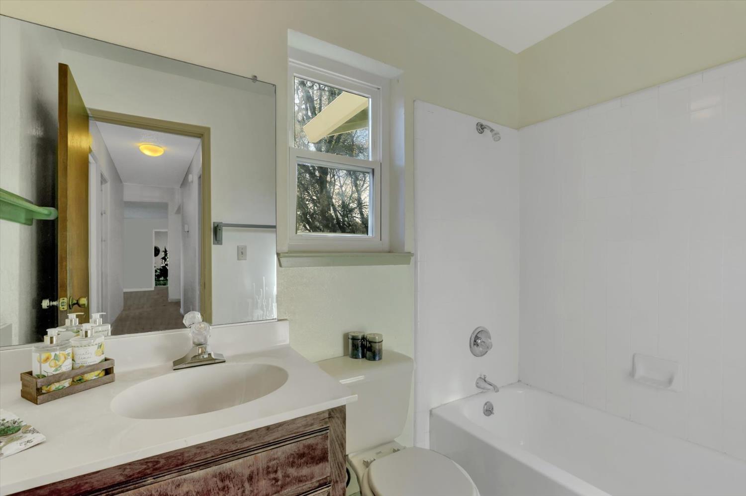 23126 Foothill Road Auburn, CA 95602 - Photo 34 of 63 a bathroom with a sink and a mirror