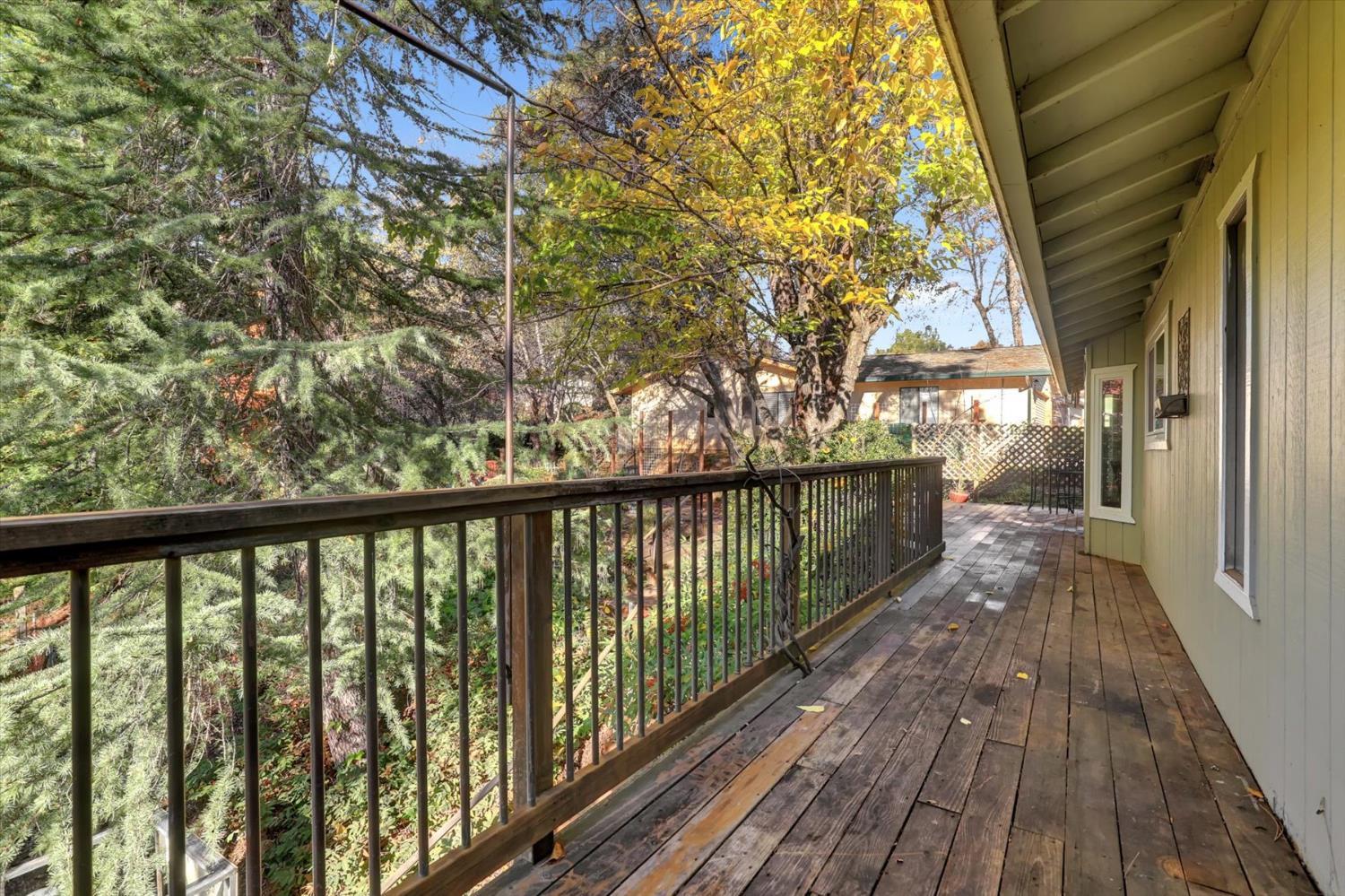 23126 Foothill Road Auburn, CA 95602 - Photo 52 of 63 a view of a balcony with wooden floor