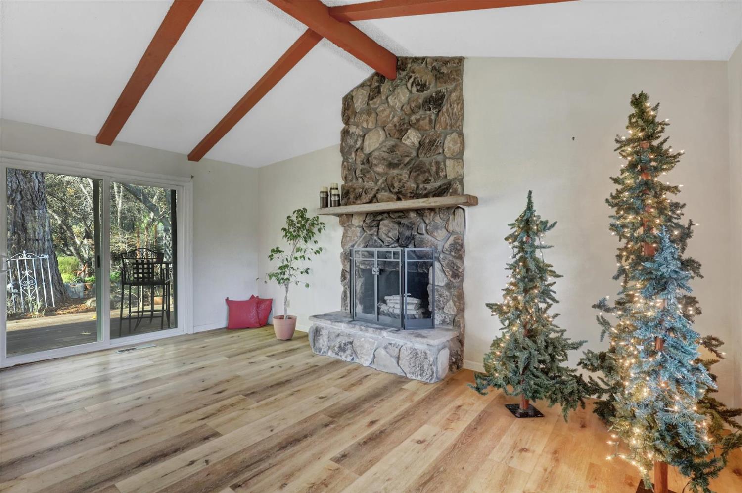 23126 Foothill Road Auburn, CA 95602 - Photo 10 of 63 a living room with furniture and a fireplace