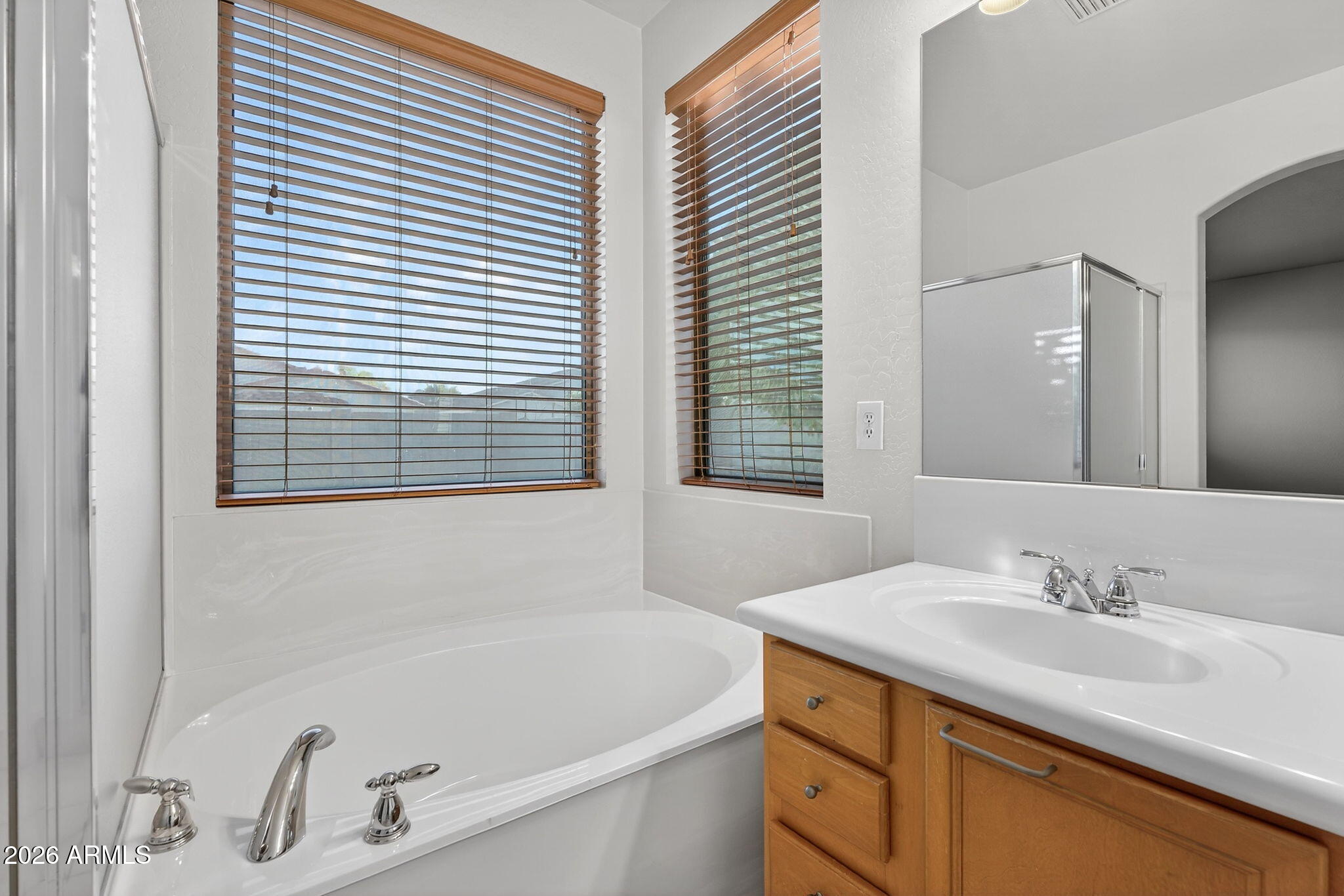 8217 West Bloomfield Road Peoria, AZ 85381 - Photo 20 of 48 a bathroom with a sink and a bathtub