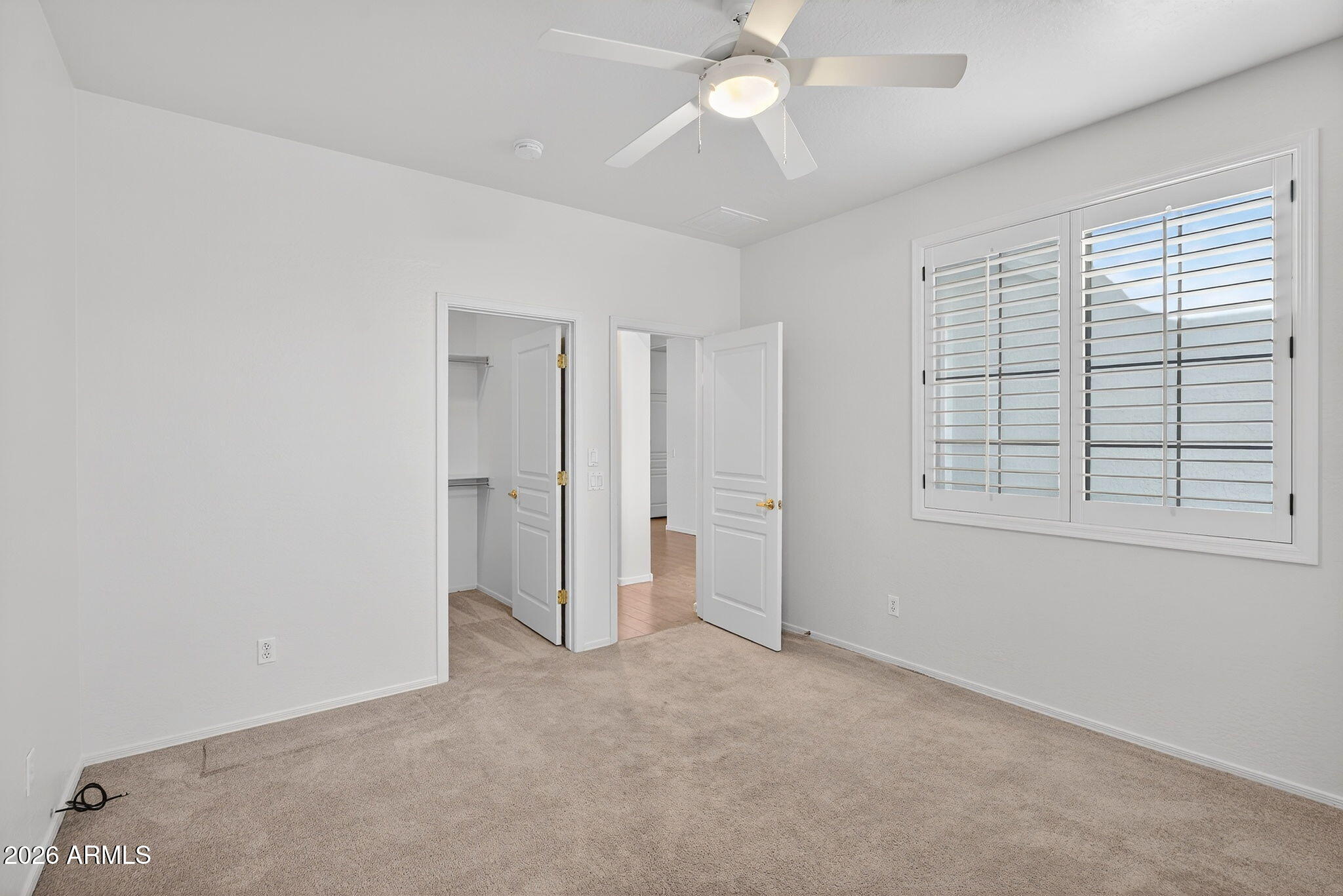 8217 West Bloomfield Road Peoria, AZ 85381 - Photo 24 of 48 a view of an empty room with a window