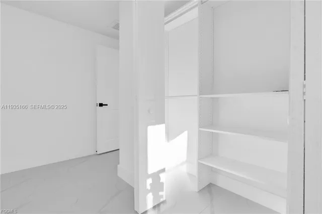 a view of bathroom and bathtub