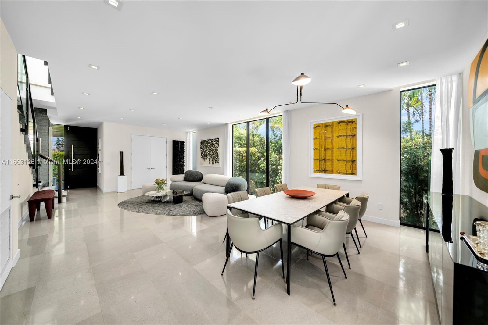 5327 North Bay Road Miami Beach, FL 33140 - Photo 7 of 37 a view of a dining room with furniture and a window