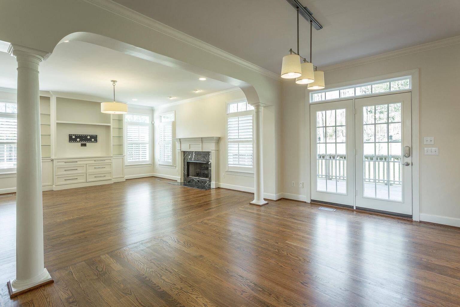 9619 Windrose Circle Chattanooga, TN 37421 - Photo 21 of 69 a view of an empty room with wooden floor and a window