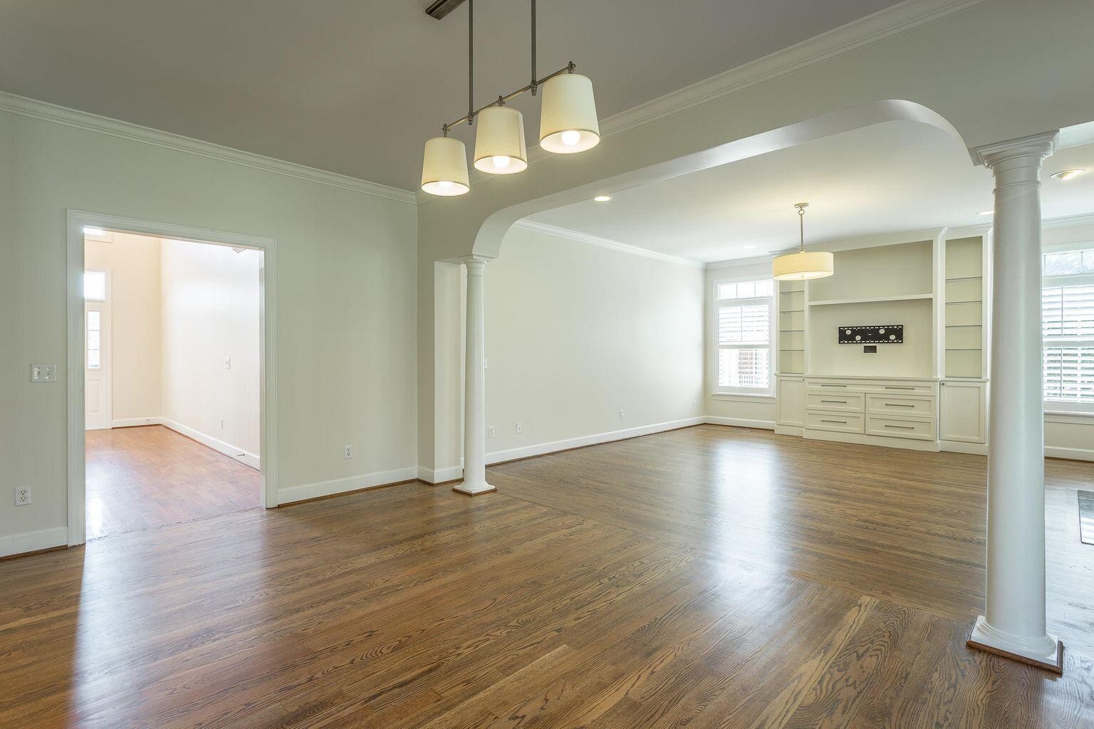 9619 Windrose Circle Chattanooga, TN 37421 - Photo 23 of 69 a view of an empty room with wooden floor and a window