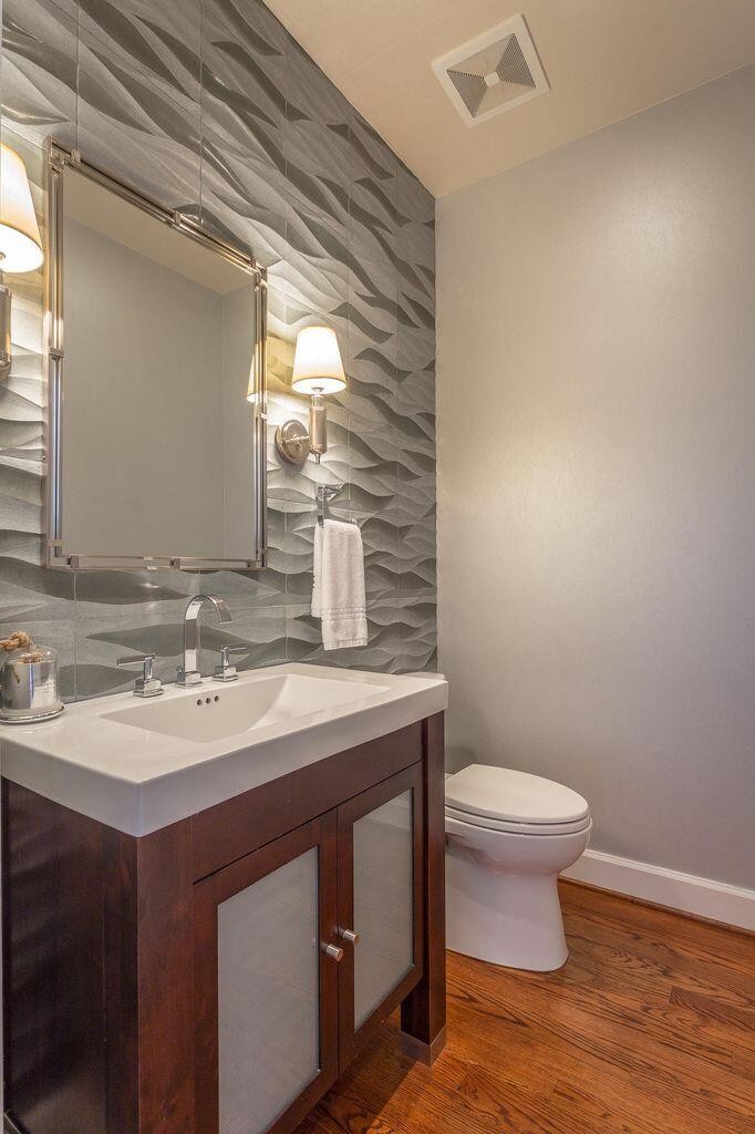 9619 Windrose Circle Chattanooga, TN 37421 - Photo 28 of 69 a bathroom with a sink toilet and mirror